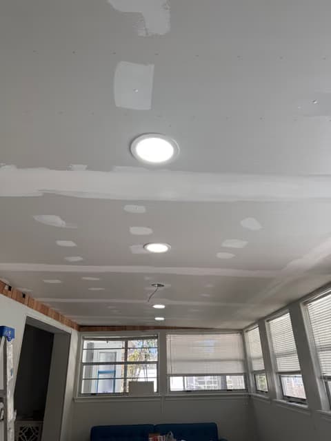 Recessed lighting installed in a hallway ceiling